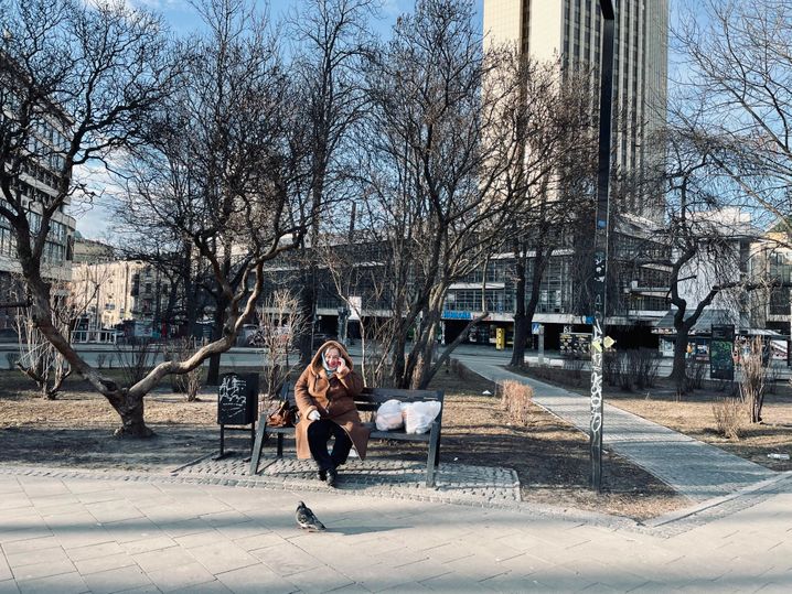 The smiling woman with the shopping bags in the park said: “We will win.”