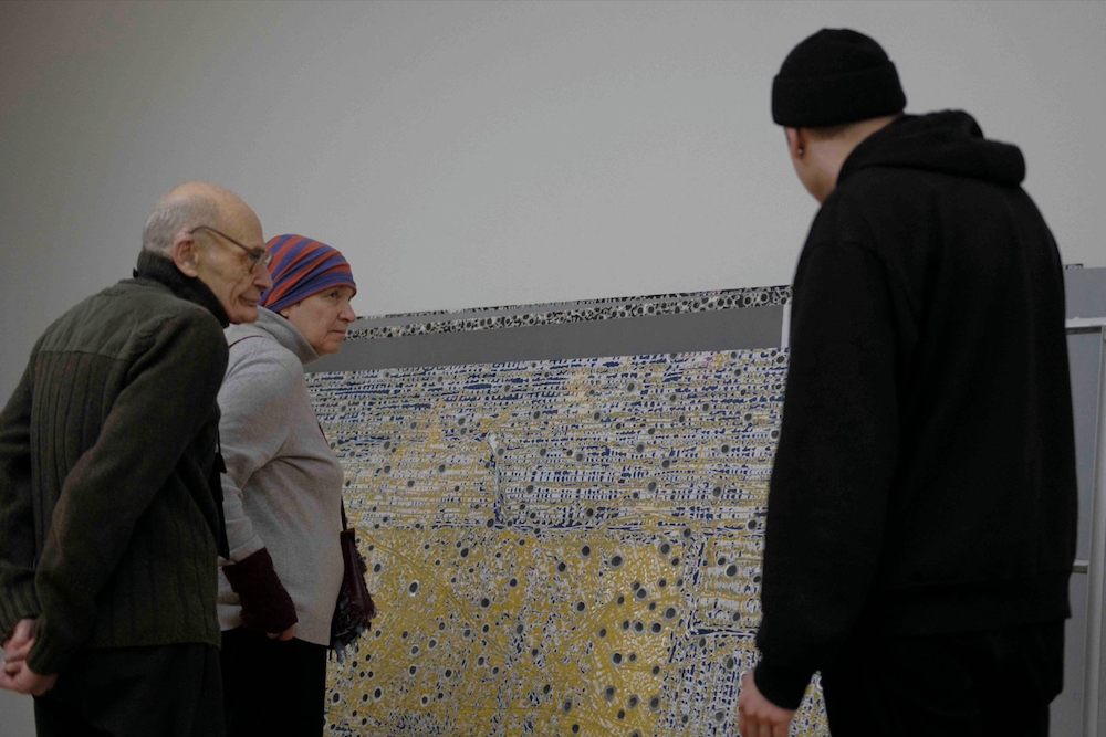 A friend of mine, the artist Nikita Kadan (right), has opened an exhibition in a basement gallery. Here he is chatting with my parents about the untranslatability of the exhibition’s title “Tryvoha,” which means “fear” and “alarm” at the same time.