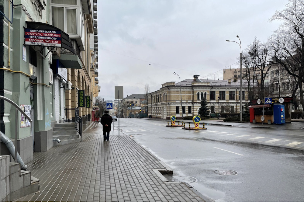 As I took my camera out of my pocket to photograph an empty street, a car stopped next to me. Four armed men jumped out. They searched my cell phone, my bag, then asked who I was working for. Then they excused themselves. All four looked nervous and tired.