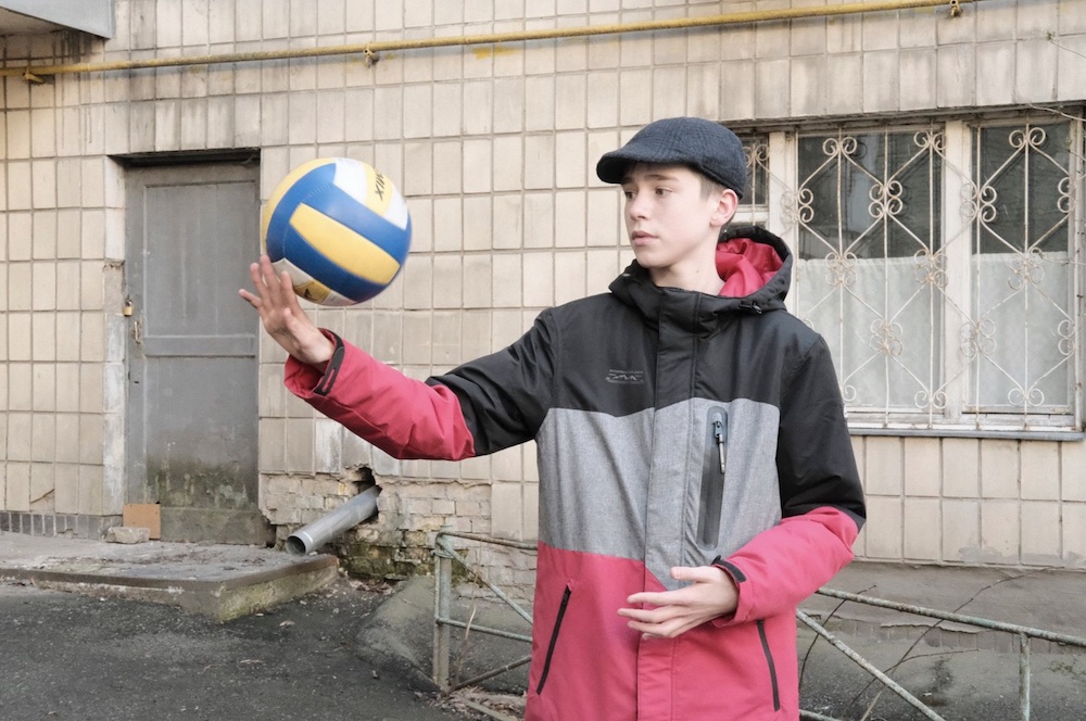 Today I met Timofij, who is fourteen years old and has stayed in Kyiv with his family. Almost every day, he plays soccer with a friend on the empty streets.