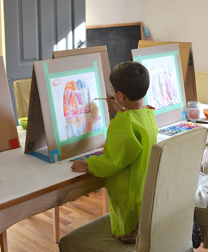 Make a tabletop easel from cardboard.
