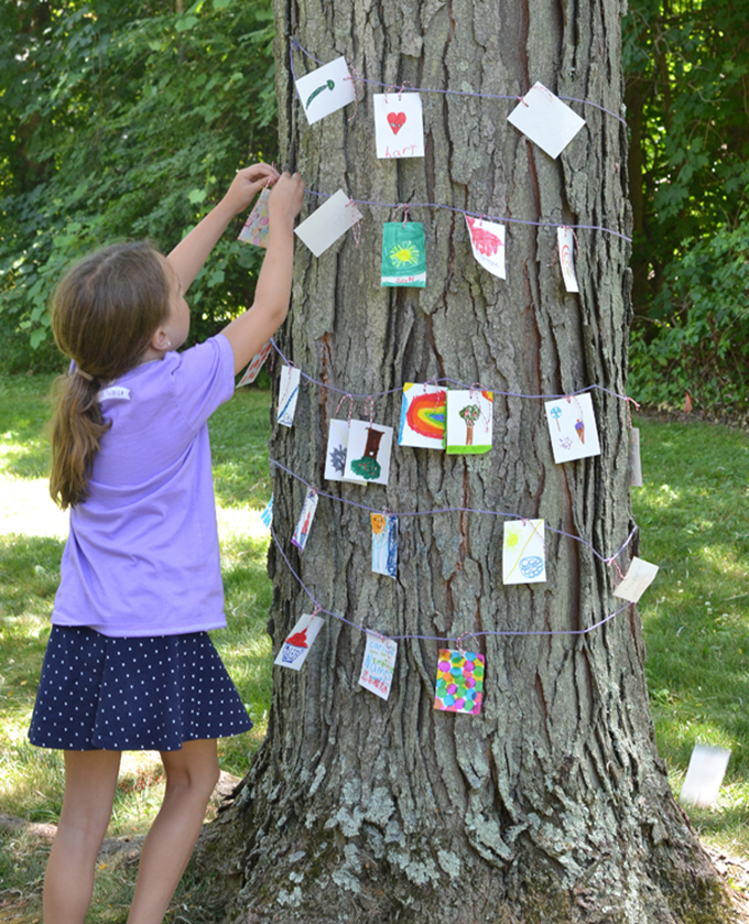 Create outdoor, public art on a tree with simple drawing prompts.
