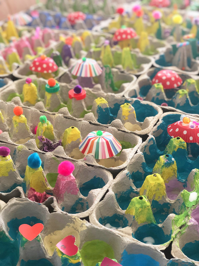Glue egg cartons inside a big box and let kids create their own, imaginary village with paint and collage.