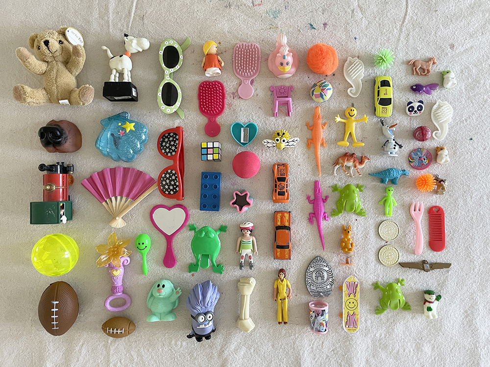 Make a junk toy mirror with upcycled toys.